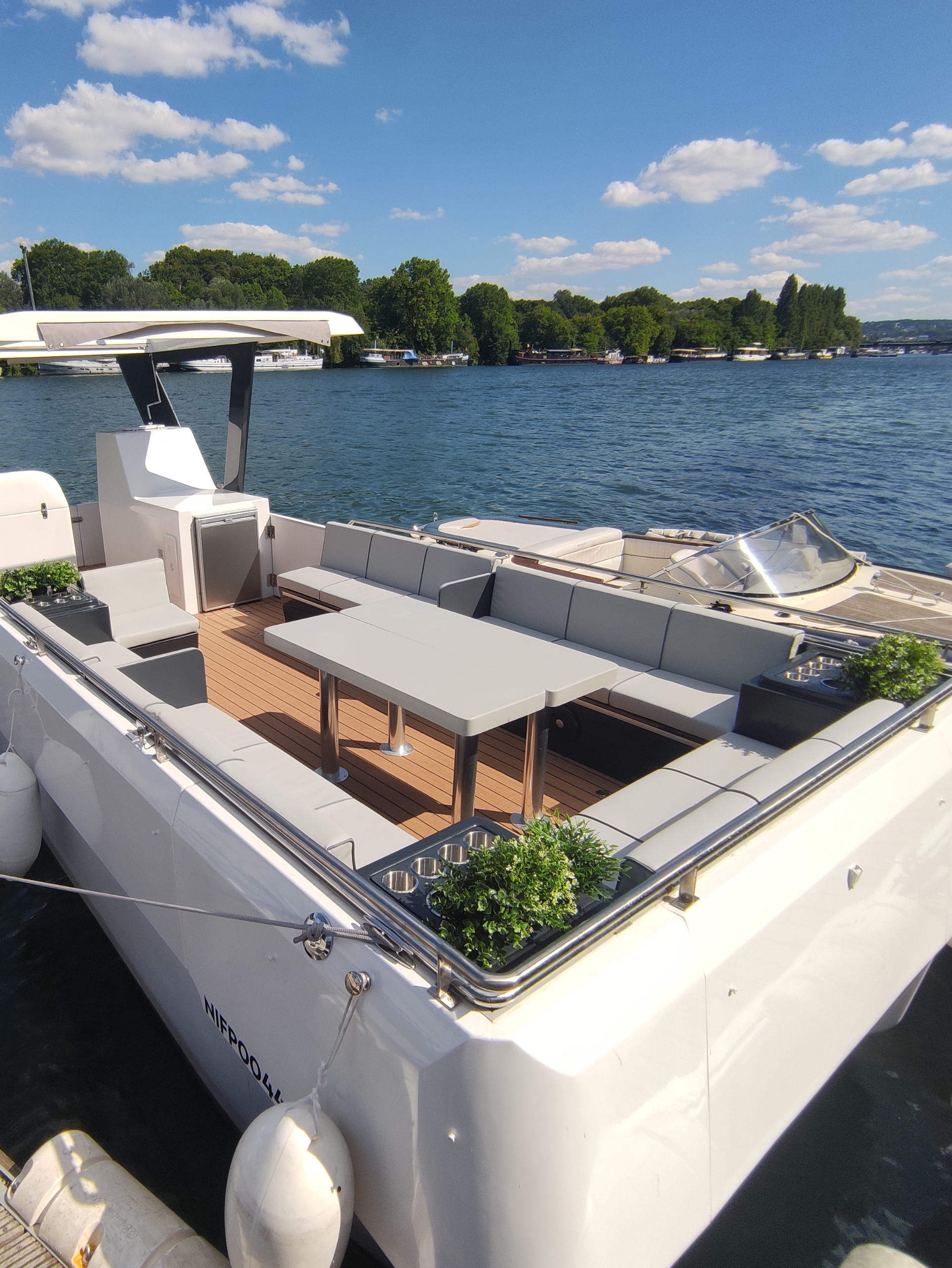 Side view of luxury pontoon boat in Paris
